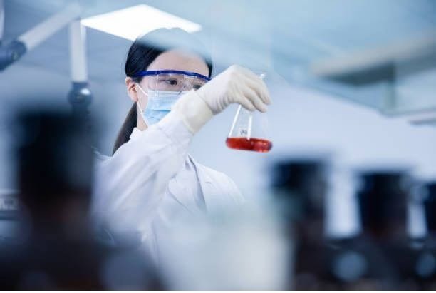 Formulation scientist examining a sample